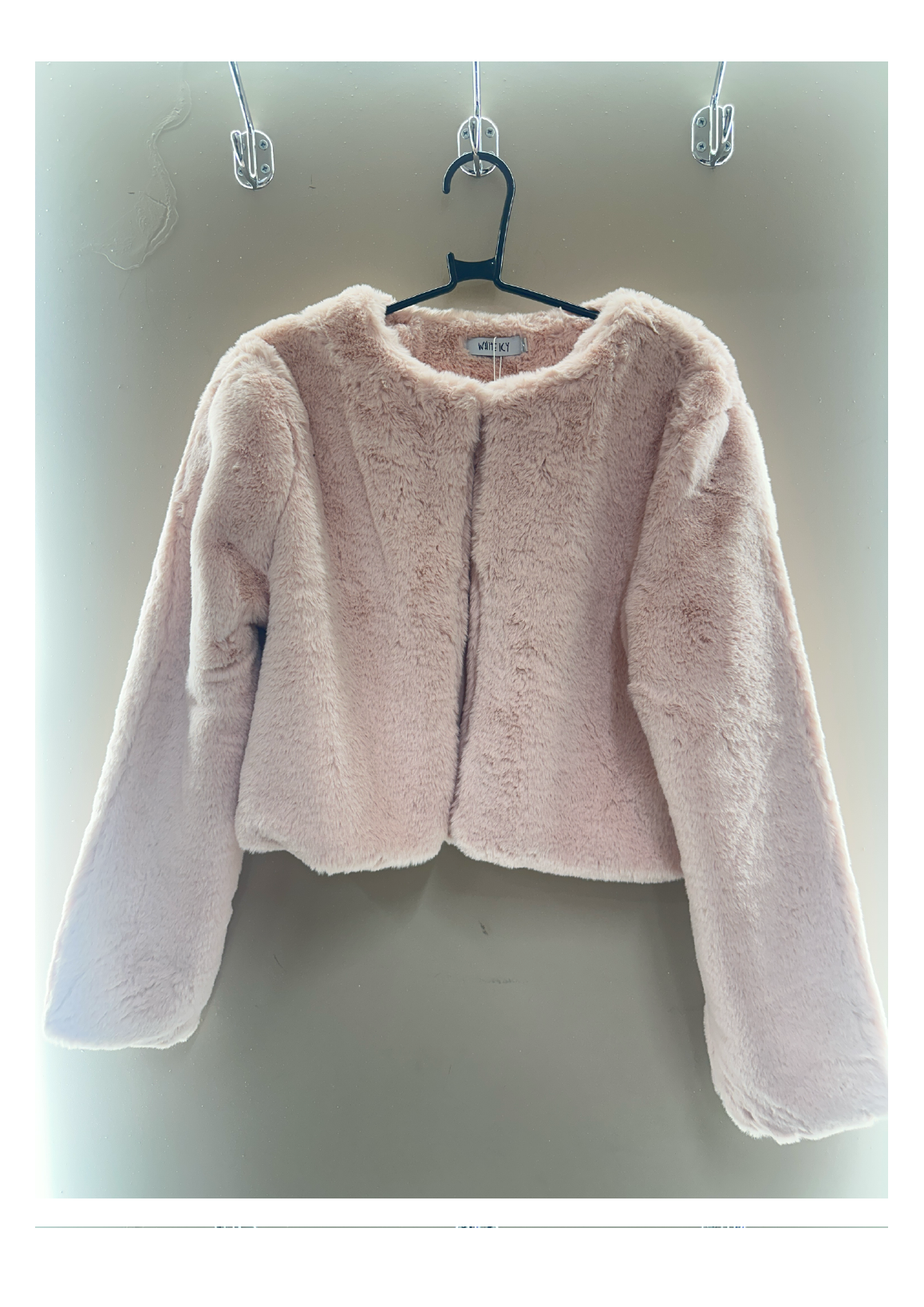 Pink cropped faux fur jacket